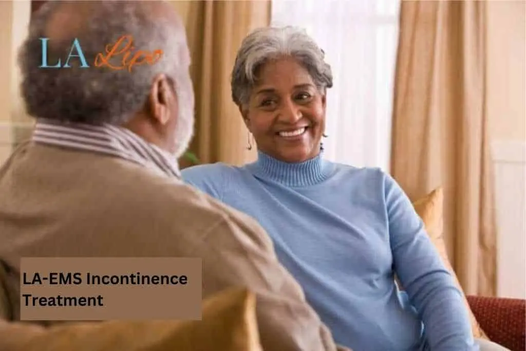 Couple sat smiling at each other - LA-EMS treatment Enfield Town