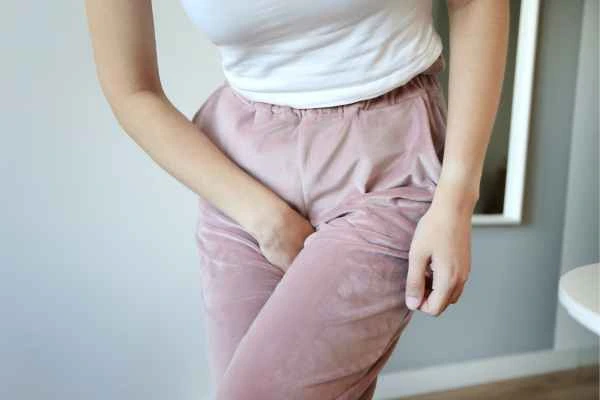 older woman running to the toilet because of urinary incontinence Enfield Town