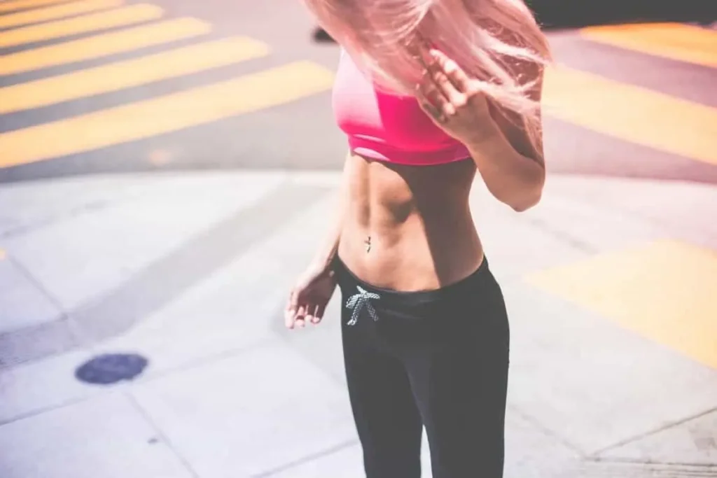 Woman with toned stomach after LA-EMS Body Sculpting Treatment Enfield Town 
